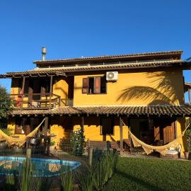 Residencial Casa Amarela, hotel in Garopaba