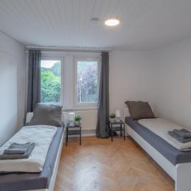 WORK&SLEEP - moderne Apartments mit Einzelbetten, TV, WLAN, Bettwäsche und Handtücher