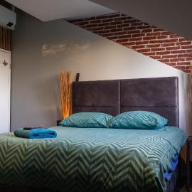 Koraal - Comfortabele kamer bij B&B Gezond aan Zee - Exclusief Wellnesstuin, hotel i Ouddorp