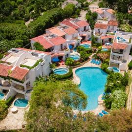 Merlin Bay Beach Villas, hotell i Saint James