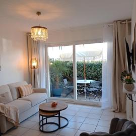 Appartement Rez- de- chaussée convivial proche mer avec terrasse, Hotel in Cucq
