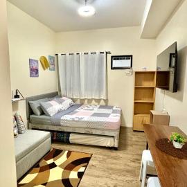 Cozy Studio Condo Unit at Fullerton Suites, хотел в Silang