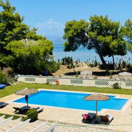 SUNRISE BEACH VILLA, - garden gate opens onto the beach