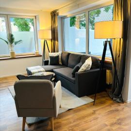 REMA Homes - Moderne Apartments mit Jacuzzi in Bad Bellingen โรงแรมในบัดเบลลิงเงน