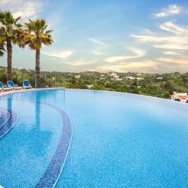 Modern apartment with in-&outside pool, sauna&gym, heating, rooftop terrace with amazing sea&mountains view