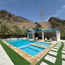 Hidden Valley Farm Home AE, хотел в Bulaydah