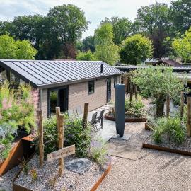 에페에 위치한 호텔 Modern ingericht chalet op groen park op de Veluwe