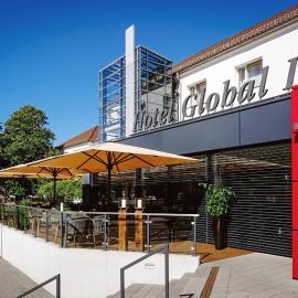 Hotel Global Inn، فندق في فولفسبورغ