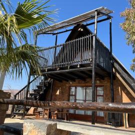 Tonquani Bush Chalet, хотел в Рустенбург