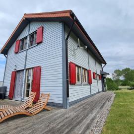 H12 Holz-Ferienhaus Haffblick Russow nahe Ostseebad Rerik, hotel in Russow