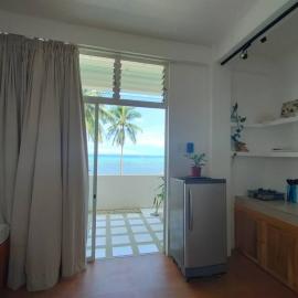 Absolute Beachfront Studio with Kitchen & Balcony