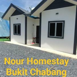 Nour homestay Rumah B, hotel a Kaki Bukit