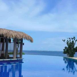 Budget friendly 1bedroom in The Mactan Newtown with pool&beach access, hotel di Punta Engaño