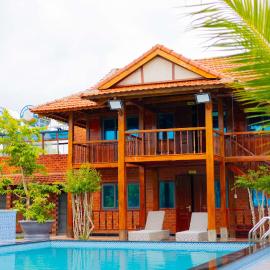 Homestay Bằng Lăng Tím - Bình Thuận, hotel Hàm Tân városában