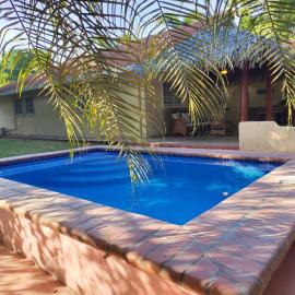 Beach House with Pool Steps away from the beach
