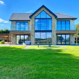 Stunning modern home set in beautiful grounds.