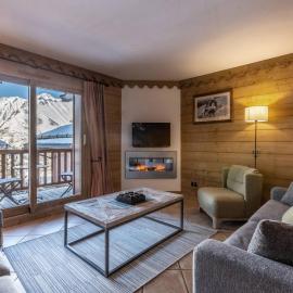 Appartement cosy avec piscines et spa, pied de pistes, 8 pers, cheminée, parking, animaux admis