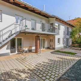 Maisonette mit Kaminöfen Nähe Starnberger See und München, хотел в Мюнсинг