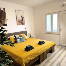 Room 'Šima' with private bathroom and free air-conditioned summer kitchen