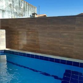 Casa em Itanhaém com 2 quartos garagem p 2 carros, churrasqueira, piscina 200 m da praia