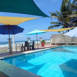 MARDEORO BEACH HOUSE, hotel in Barra de Santiago