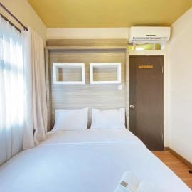 Simply Homey 2BR at Suites @Metro Apartment By Travelio