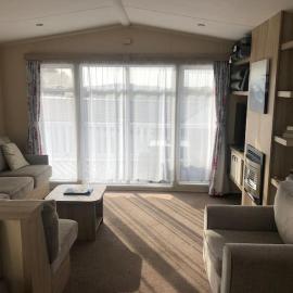 Cute caravan Whitecliff Bay