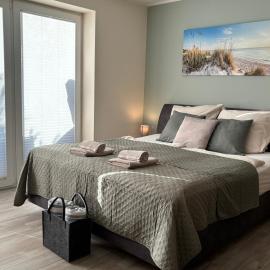 Kleine Auszeit -- inklusive Parkplatz & WiFi, Geschirrspüler, Waschmaschine & Terrasse mit Strandkorb -- Perfekt für Urlaub & Business, Hotel in Scharbeutz