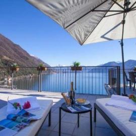 Attico Con Grande Terrazza vista Lago, hotelli kohteessa Argegno