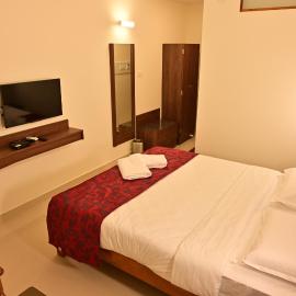 Poorva Residency, hotel u gradu 'Hassan'