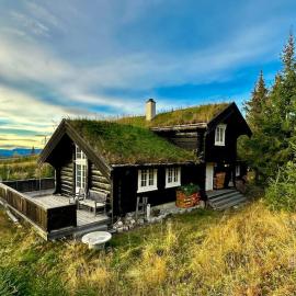Log cabin in Hafjell with ski in ski out, sauna and view, hotel a Hafjell