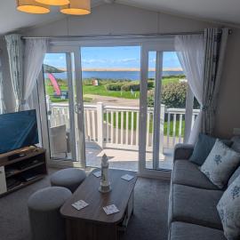 STYLISH HOLIDAY HOME WITH UNINTERRUPTED VIEWS OF THE FLEET LAGOON ON Haven LITTLESEA HOLIDAY PARK