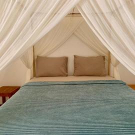 the village rua beach homestay, Hotel in Rua