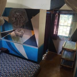 Chez Yaya, chambre bleue โรงแรมในOussouye