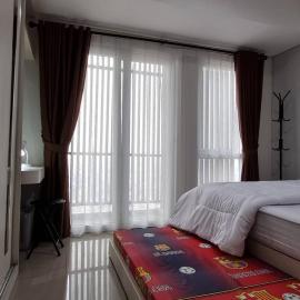 Apt Breeze Bintaro 1BR with Pool, Wi-Fi and Netflix by Damaresa