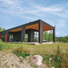 Three-Bedroom Holiday Home Holmsjö With A Fireplace 06, hotel in Holmsjö