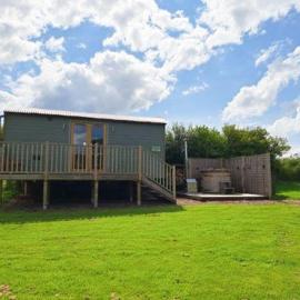 Puddleduck Hut Armathwaite with hot tub and dog agility course, perfect for a romantic break