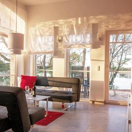 Fischadler - Ferienwohnung mit Terrasse, Kamin, Bootsverleih & Seezugang