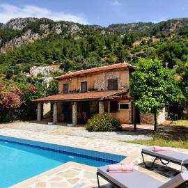 Stone house in Faralya