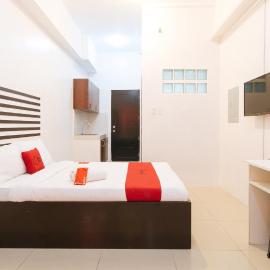 RedDoorz @ Jardin LRT Tayuman Manila, хотел в Манила