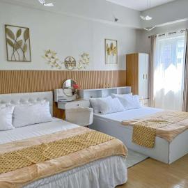 Auberge Condotels at SMDC Hope Residences، فندق في Trece Martires