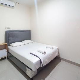 D Cost 19 Syariah Mitra RedDoorz، فندق في Palas
