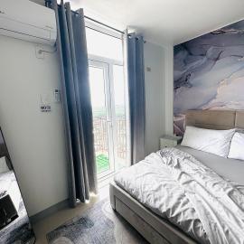 Affordable Condo with Fast Wifi & Near Airport, hotel em Lo-oc
