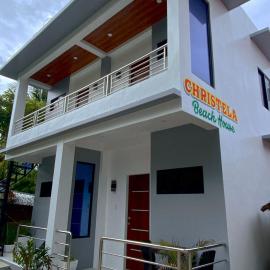 Christela Beach House, viešbutis mieste Pooc