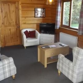 Hand built log cabin at Avonvale Holiday Lodges