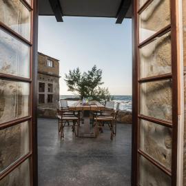 kito- transformed house on the water's edge