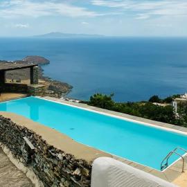 Andros -Stone house with shared pool & seaview