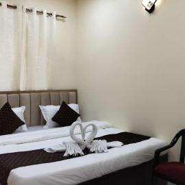 Om Palace Inn