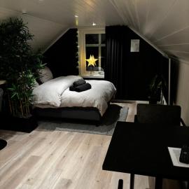 NY og moderne studioleilighet med elbil lading, hotell i Gjøvik