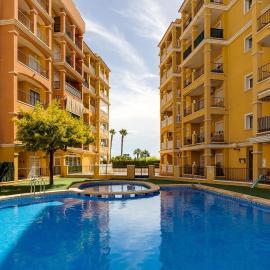 Sunny ground floor apartment with a large terrace and direct access to the pool, hotel a La Mata